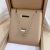 [Acero de titanio de cuerpo completo] Collar de oro real con tres anillos, cintura pequeña, personalidad minimax, horno de viento, cadena de clavícula roja de red para mujer