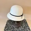 Elegante sombrero de pescador de lana estilo francés para mujer, otoño e invierno, chic y elegante con un lazo, estiliza el rostro, un regalo para una joven