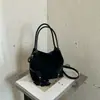 Bolso de cubo de gamuza a la moda 2026 nuevo bolso de mano de felpa exquisito bolso cruzado de hombro con estampado de leopardo para mujer invierno vintage simple