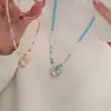 Original Elegante y Exquisito Collar de Cuatro Hojas de Trébol Calado de Colores Calabaza Piedra Natural con Cuentas Cadena de Suéter Simple de Alta Gama