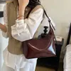 Bolsa de ombro vintage versátil estilo francês, nova tendência, para usar no antebraço, no ombro ou como bolsa de mão para mulheres.