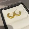Novos brincos de tarraxa coloridos com formato torcido estilo minimalista nicho alta qualidade versáteis para o dia a dia joia de orelha de luxo leve para mulheres