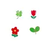 Comércio Exterior Novo Lindo Planta Pequena Flor Vermelha Emblema Trevo de Quatro Folhas Folhas Verdes Flor de Ameixa Vermelha Liga Gota de Óleo Broche