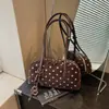 Colección de otoño 2026 transfronteriza: bolso de axila de lunares retro y a la moda, bolso de hombro estilo coreano, un bolso de mano único y versátil para mujer