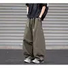 Pantalones de chándal grises estilo americano para hombre, pantalones largos casuales de pierna ancha deconstruidos para otoño/invierno, pantalones pesados de caída con pierna curva