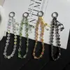 Cadena para teléfono colgante de cuenta de plata tipo terrón de azúcar popular de lujo, accesorio de bolso de cristal de moda de alta gama para mujer