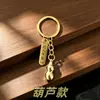 Estilo étnico chino joyería aleación llavero colgante accesorios metálicos regalo para hombres y mujeres decoración al por mayor para vendedores ambulantes