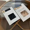 Calcetines de red B de fábrica de origen para mujer Paris JK sexy negro seda corte arbitrario ajustado antienganche pantimedias de seda