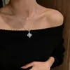 Collar con colgante de Vajra y trébol de cuatro hojas, cadena para suéter de nicho de lujo ligero para mujer, joyería de cadena para el cuello de estilo chino nuevo de alta gama