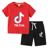 Camiseta infantil 2022 TikTok verano nueva ropa infantil de comercio exterior coreana pantalones cortos de manga corta para niños traje de dos piezas