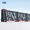 Puerta corrediza seccional eléctrica de aleación de aluminio, puerta corrediza seccional sin rieles, puerta recta, puerta retráctil automática para patio de fábrica escolar