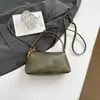 Bolsa Feminina de Nicho Estilo Coreano 2025 Inverno Nova Bolsa para Trabalho e Dia a Dia Elegante Simples Casual de Mão