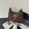 Bolso pequeño transfronterizo para mujer 2026 nuevo estilo versátil para el trabajo sensación de alta gama bolso de hombro cruzado estilo popular bolso tote de axila