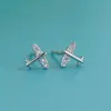 Brincos Runxin de zircônia em formato de laço femininos versão coreana de brincos de aviãozinho Carro de diamante Brincos mini assimétricos de coração