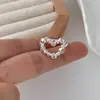 Anillo de Plata de Ley S925 Corazón Hueco Brillante con Incrustaciones de Circonita Estilo Coreano de Alta Gama Nuevo Anillo de Lujo Ligero Otoño e Invierno 2026