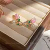 Aretes de perla con flor de gota de aceite de aguja de plata, frescos, dulces, simples, versátiles, de nicho, de alta gama, modernos para mujer