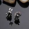 Comercio electrónico transfronterizo comercio exterior fuentes de una generación de moda europea y americana personalidad calavera de diamante acero de titanio pendientes para hombre