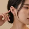 Pendientes Coreanos de Corazón Hueco para Mujer, Exquisitos y Dulces Pendientes Plateados Electrochapados, Pendientes de Lujo Ligero y de Gama Alta, Pendientes al por Mayor
