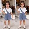 Baoxin Ropa de Verano Nueva Estilo Europeo y Americano Transfronteriza Shorts de Peto de Mezclilla Blancos de Manga Corta Cruzados Hebilla Única Conjunto Creativo de Ropa para Niños