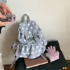 Mochila de lunares estilo coreano para mujer 2025 Nuevo estilo Mochila de viaje de nicho Gran capacidad Versátil Mochila escolar para estudiante