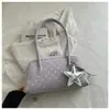 Bolsa-almofada de poá de nicho estilo coreano para mulheres com pingente de estrela, bolsa de mão para axila, novo modelo 2026, bolsa de ombro versátil para o dia a dia