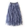 Venta al por mayor de fábrica 2023 falda midi irregular de costura de malla adelgazante versátil de moda con cintura elástica