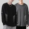 Camiseta de manga larga para hombre para primavera y otoño, disponible en blanco puro y negro, con cuello redondo, adecuada como capa base o camiseta interior, y un diseño fino y ligero para usar en otoño