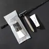 Cepillo de dientes desechable de hotel suministros de hotel viaje cerdas suaves con pasta de dientes traje de lavado hogar y estancia fabricantes mayoreo
