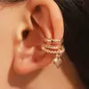 Nuevos aretes de clip de corazón de cobre incrustado estilo europeo y americano transfronterizo para mujeres sin perforaciones, aretes de doble capa únicos y simples estilo ins