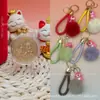 Oro Puro 999520 Colgante Pequeño de Galleta de Oro Serie Oso Fresa Bola de Peluche Lanyard Tienda de Oro Tráfico Impulso de Actividad Regalo