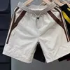 Moda nova de verão shorts casuais masculinos simples de retalhos versáteis confortáveis respiráveis esportivos de secagem rápida comprimento até o joelho para homens