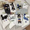 Calcetines de media pantorrilla para mujer de primavera y verano con estampado de gato de dibujos animados, nueva versión coreana con diseños de gatitos y letras, calcetines de media pantorrilla japoneses lindos y juveniles
