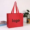 Bolsas de tela no tejida laminada de alta gama, diseños personalizados en relieve, producción a granel y bolsas de regalo impresas disponibles