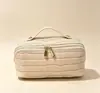 Bolsa de maquillaje de alta gama para mujer, estilo nuevo, gran capacidad, bolsa de cosméticos conveniente, bolsa de tocador de viaje, bolsa de almacenamiento de cosméticos
