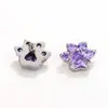 Pendientes de Botón con Patrón Floral Incrustado de Circonita de Aleación de Titanio para Mujer 2026 Nuevo Sentido de Alta Gama Sentido de Diseño de Nicho Pendiente Venta Cruzada Más Vendida