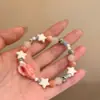 Pulsera de Caracola y Estrella de Estilo Dulce y Festivo Más Vendida Transfronteriza para Mujer Pulsera de Perlas de Color Dopamina para Mujer
