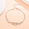 Agite o som do rápido sinal de felicidade feminina transfronteiriço versão coreana pulseira de coração duplo pulseira joias de moda europeia e americana atacado