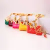 Bolsa Creativa Linda para Mujer Bolso de Mano con Pedrería Llavero Colgante de Metal Llavero Manualidad Regalo Pequeño 075