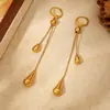 Ear Cuff Francés Doble Gota de Agua con Borla Cadena Hueso de Serpiente Chapada en Oro Pendientes Largos Colgantes Simples de Gama Alta para Adelgazar el Rostro Venta al por Mayor