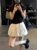 Pantalones Falda Corta Abullonados Estilo Francés Blanco Floral para Mujer Verano 2026 Nuevo Dulce Puro Petite Línea A