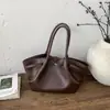 Bolso tipo cubo de alta gama, simple y versátil para mujer, Nuevo de tendencia estilo coreano Primavera Temprana 2026 Bolso de mano y bolso de hombro exquisito y elegante