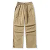 Calça longa casual Sidalet para casal, de corte solto, estilo workwear, perna reta e larga, com múltiplos bolsos, apresentando um design relaxado e estiloso.