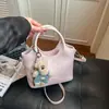 Bolsa Cesta de Legumes Portátil de Nicho Coreana para Mulheres 2026 Nova Moda Versátil Bolsa Balde Simples Super Popular Bolsa Transversal