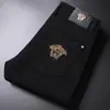 Temporada de primavera y otoño, pantalones de mezclilla grises para hombre, elásticos, modernos, corte ajustado, pierna cónica, estilo europeo, con estampados únicos, pantalones largos casuales