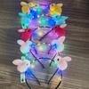 Nueva diadema de conejo luminosa cinta borla de plumas tocado pinza de pelo de felpa puesto puesto de mercado nocturno tocado brillante venta al por mayor