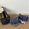 Tecido Jeans é Popular Este Ano com Designs Únicos para Mulheres, 2026 Nova Bolsa Casual Tendência de Grande Capacidade com Corrente para Axila/Ombro