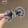 Pinza para el cabello con cuentas de cristal azul de ensueño, Nuevo estilo de lujo ligero, Pinza de resorte incrustada de diamantes, Accesorio para el cabello de moda de alta gama para mujer