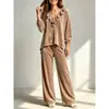 Nueva ropa de mujer transfronteriza 2026 otoño e invierno Europea y Americana terciopelo coreano color liso volantes cuello en V suelta moda casual traje para mujer