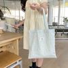 Nova Bolsa de Lona Bordada Floral Vazada para Primavera e Verão Feminina Fashionável Versátil Bolsa de Ombro Grande Capacidade Bolsa Tote para o Dia a Dia