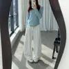 Pantalones deportivos de chándal anchos y holgados para otoño 2026 Moda callejera americana con cordón, microcurvados, casuales